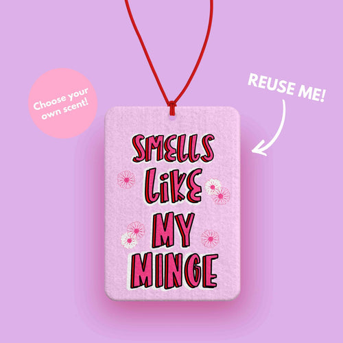 A funny and rude pink car air freshener that says smells like my minge - the perfect car accessory for her - Funny car gifts 