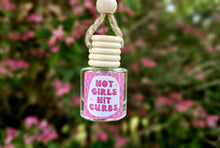 Load image into Gallery viewer, Girly pink Car diffuser, Hot girls hit curbs car diffuser glass bottle with wooden lid. cute car accessories for women. Refillable car diffuser for her. Snow Angel scented car air freshener