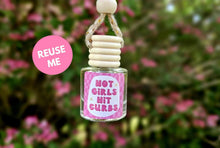 Load image into Gallery viewer, Girly pink Car diffuser, Hot girls hit curbs car diffuser glass bottle with wooden lid. cute car accessories for women. Refillable car diffuser air freshener
